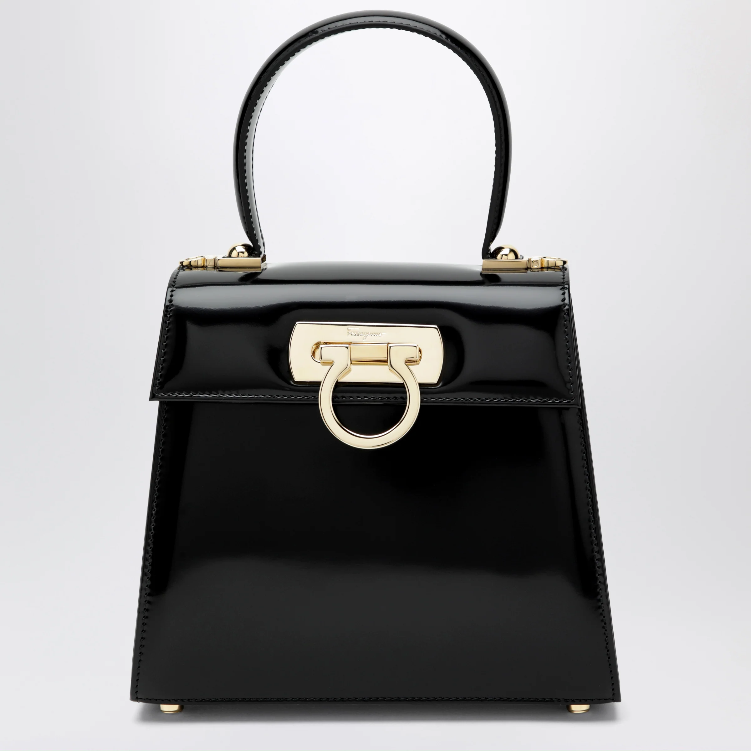Ferragamo Small black leather top-handle bag with Gancini closure