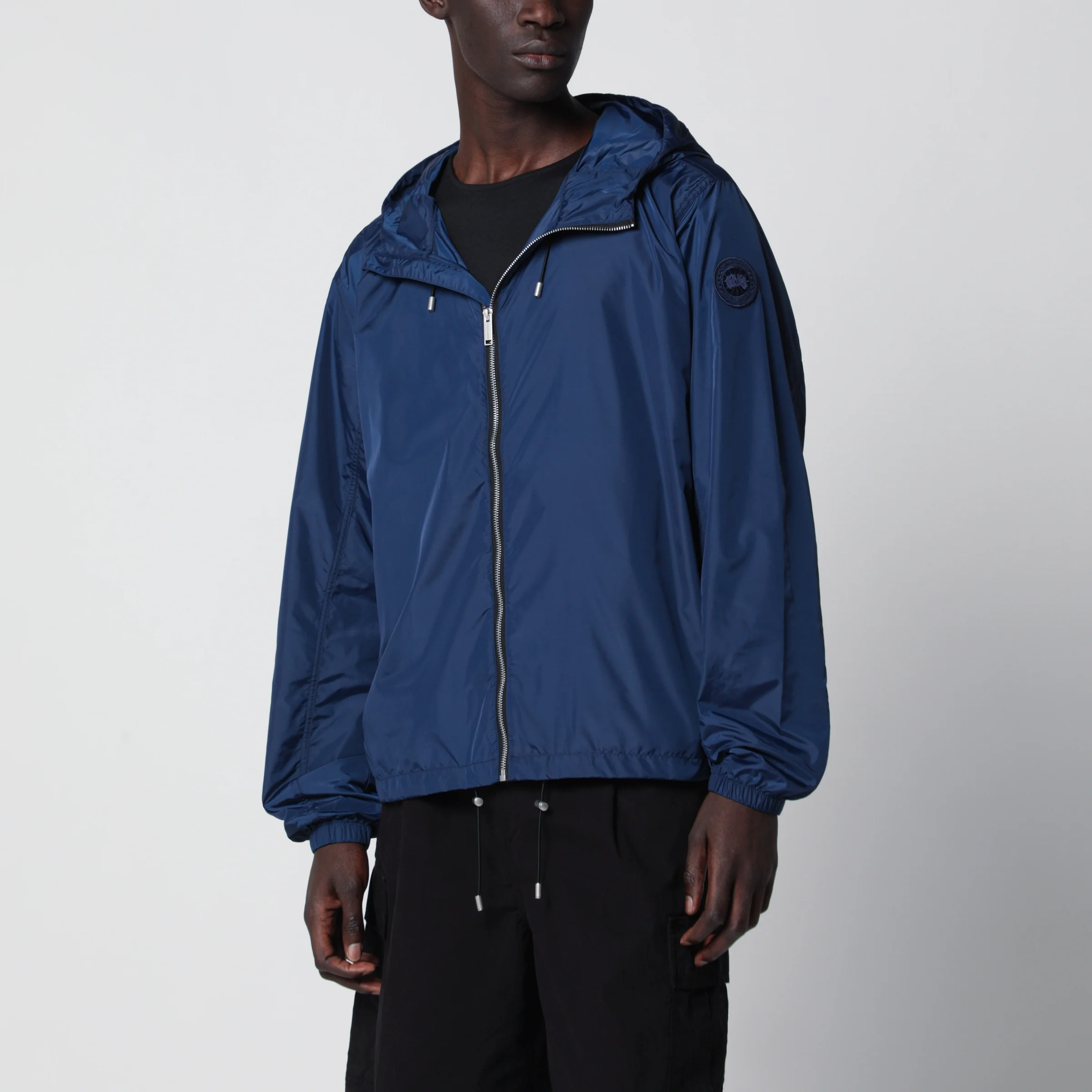 Drift hooded jacket in navy blue by Canada Goose