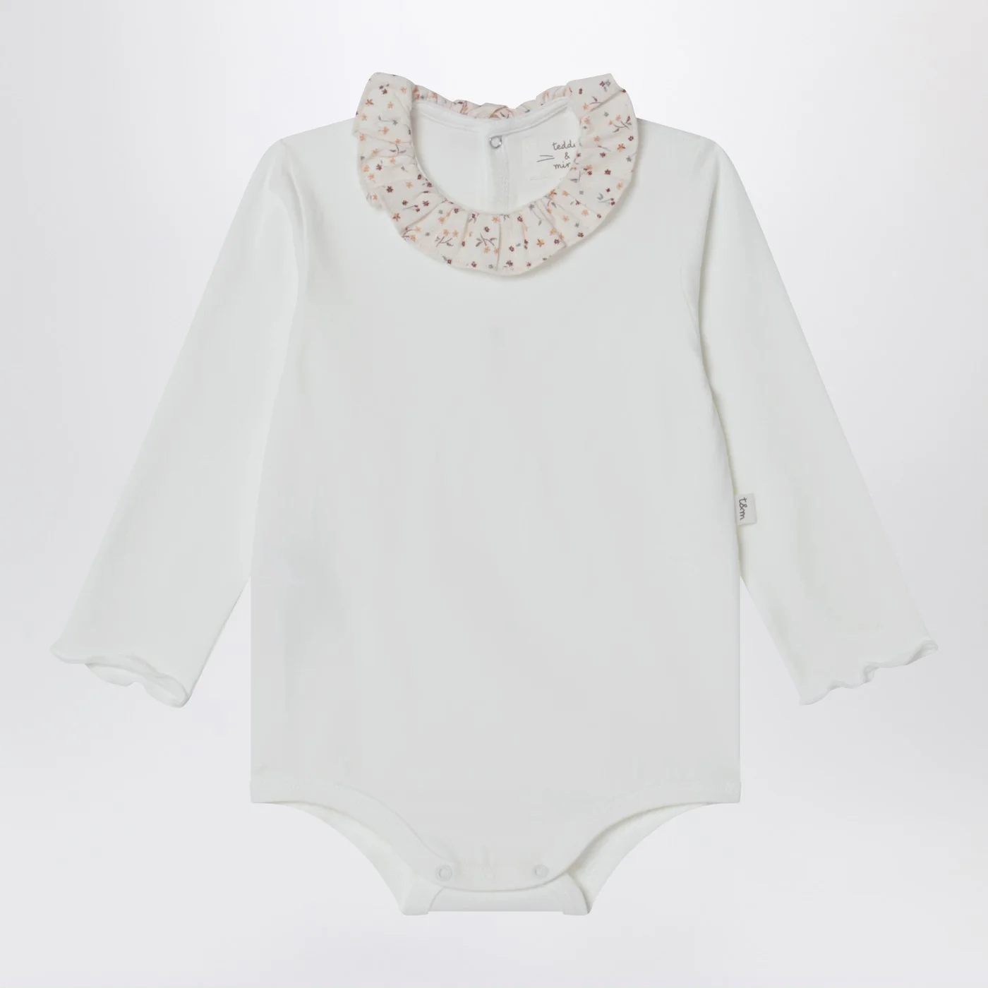 Teddy & Minou White bodysuit with neckline and floral print