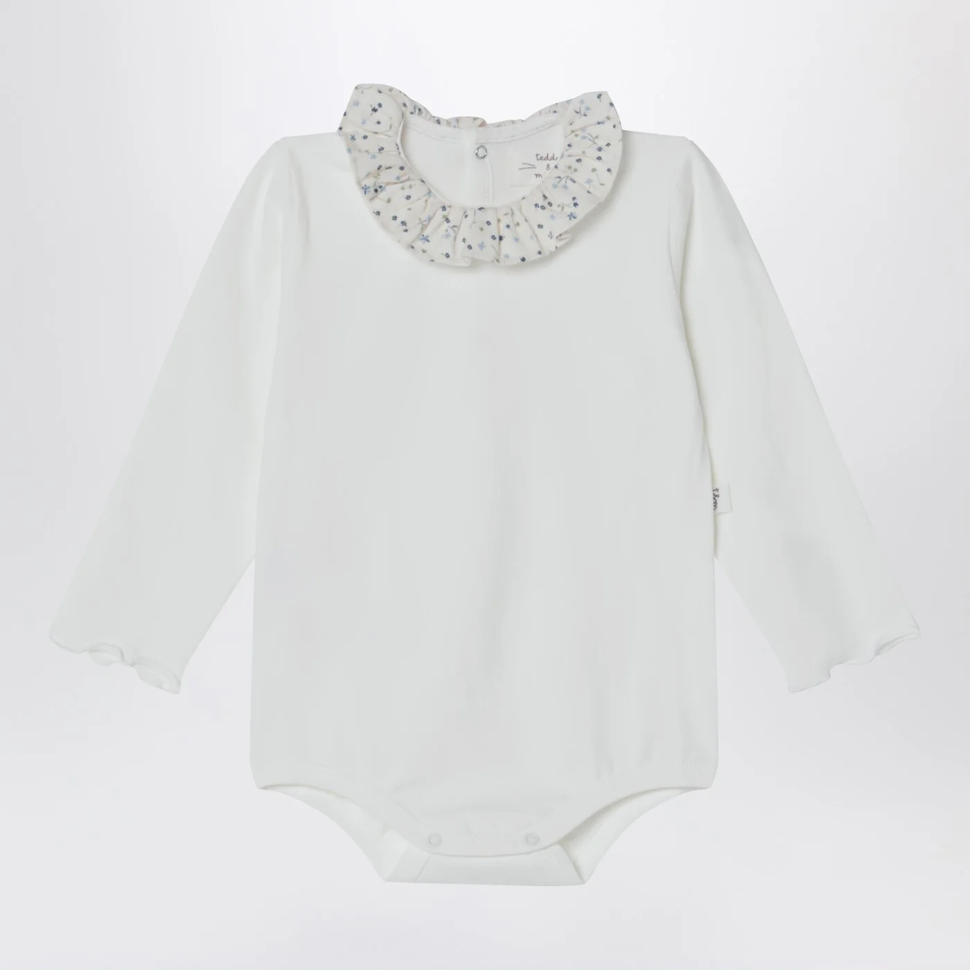 Teddy & Minou White bodysuit with neckline and floral print