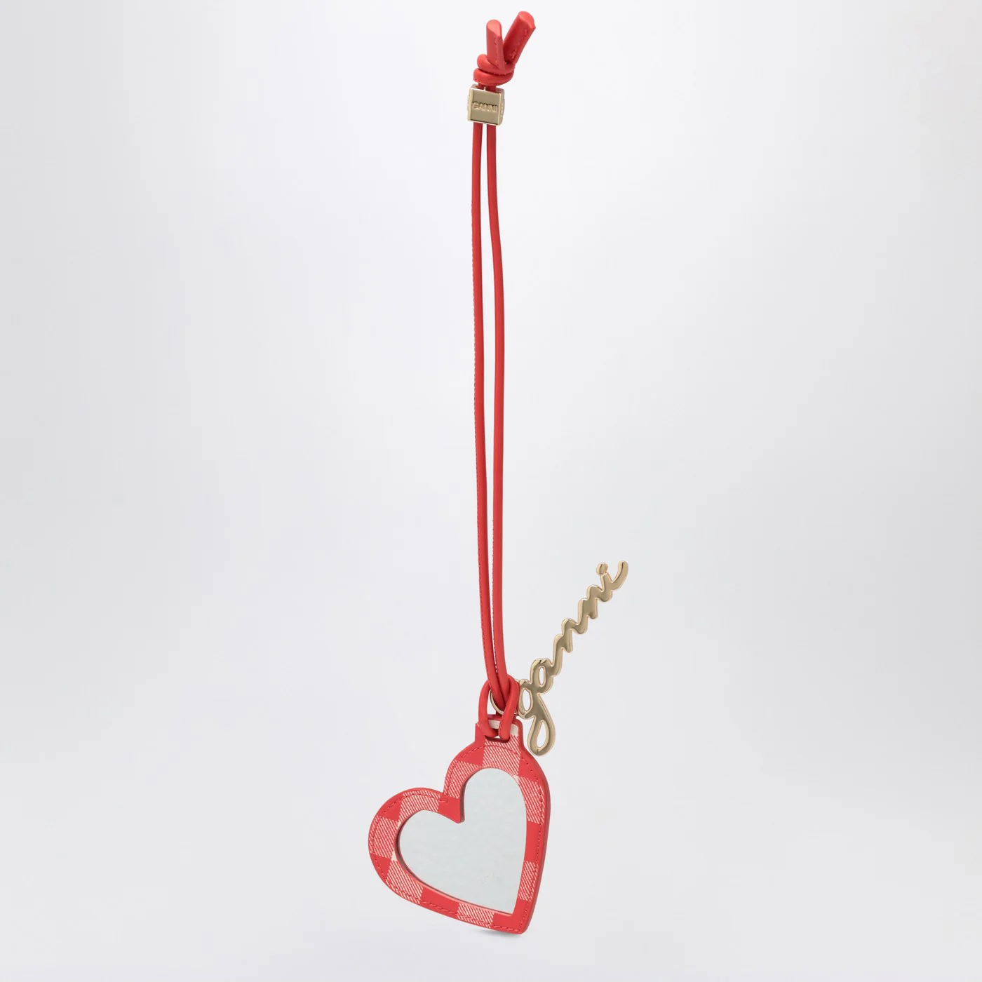 GANNI Heart-shaped mirror Bou red