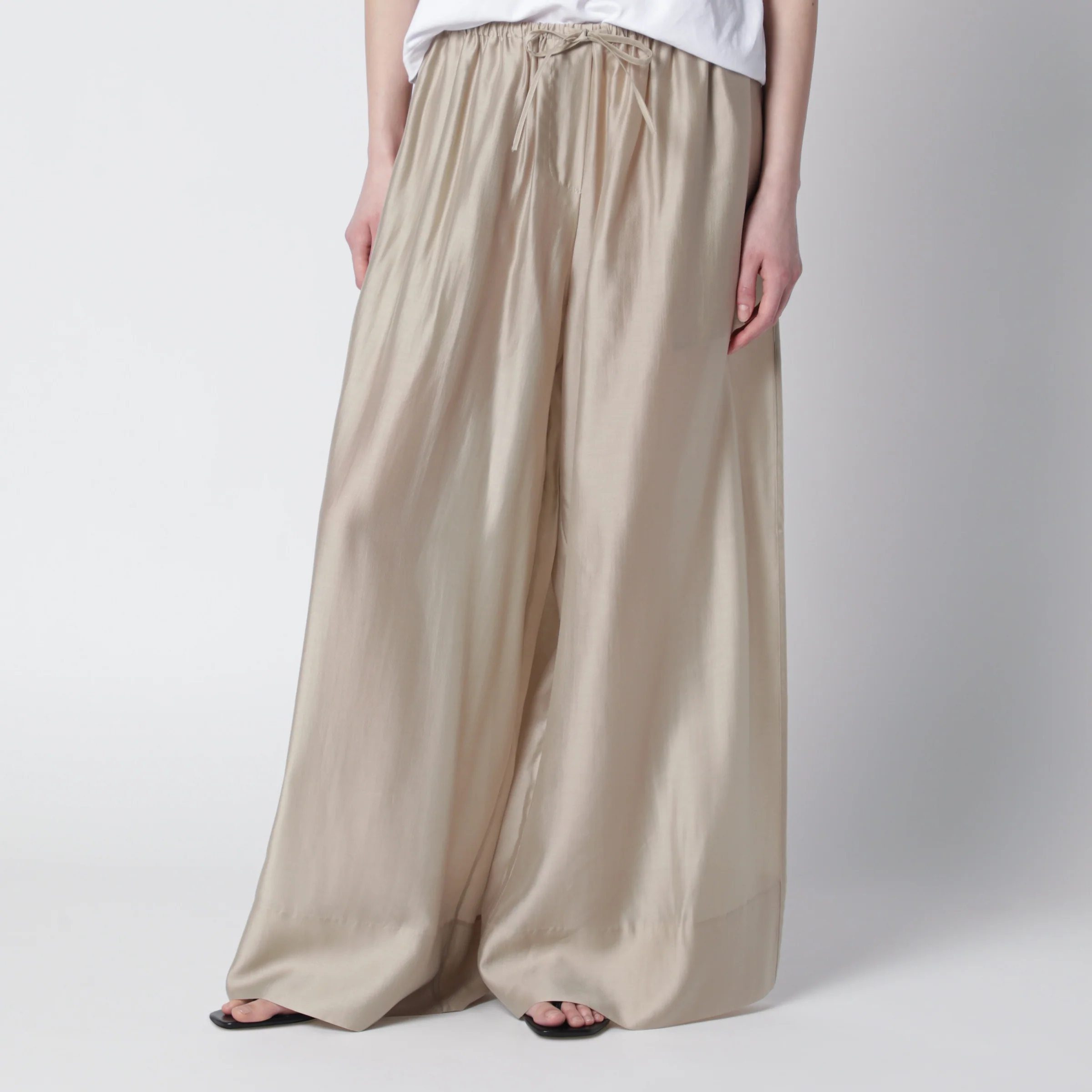 Entire Studios Vento wide-leg trousers in champagne color