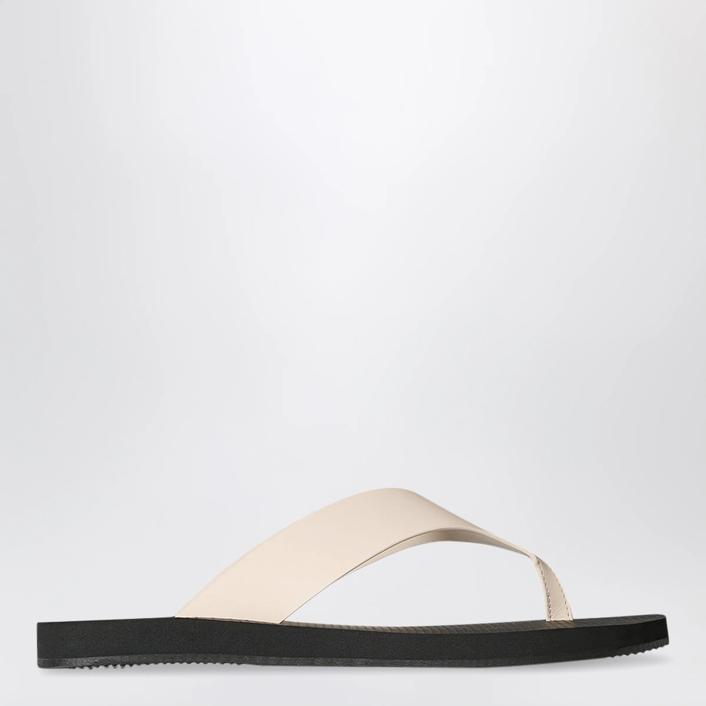 The Row Ginza calfskin leather thong sandal in ivory/black