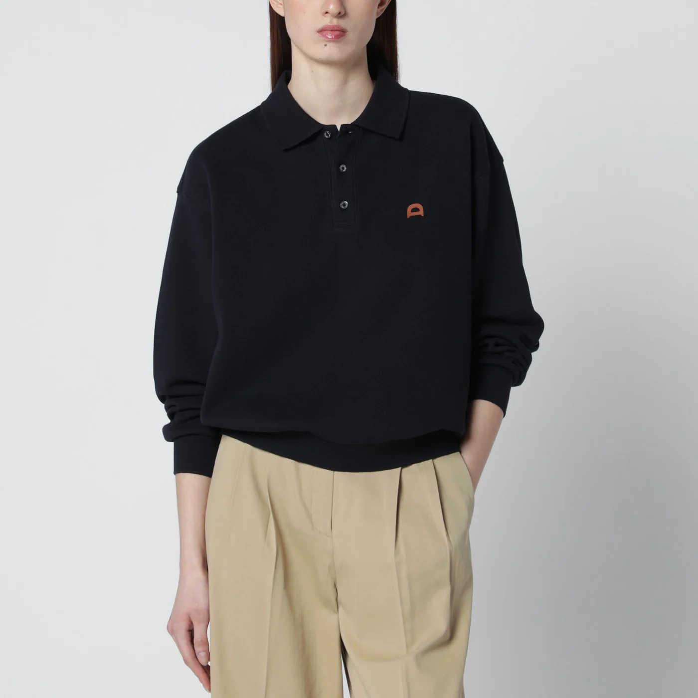 Dunst Navy blue polo shirt with leather logo